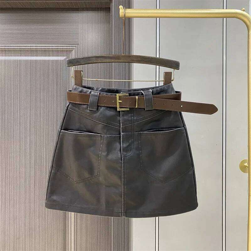 High waisted half body women's 2024 autumn winter new A-line retro PU short skirt, coffee leather skirt Z260314