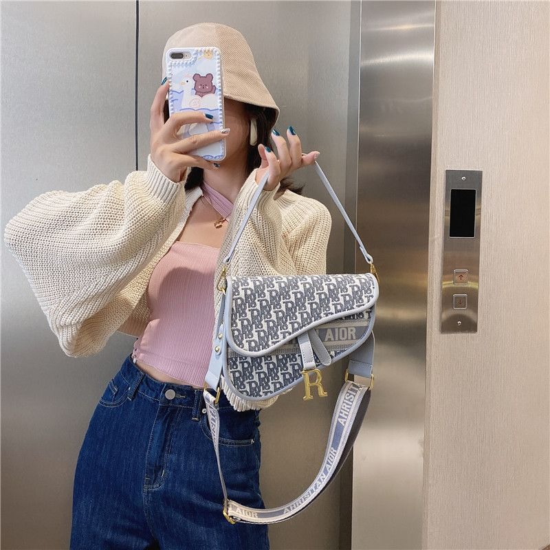 2026 TOP AA Canvas Women's Hundred Handbag Crossbody Saddle Bag Comfortable Shoulder Strap Women Large Capacity Letter Underarm Bags