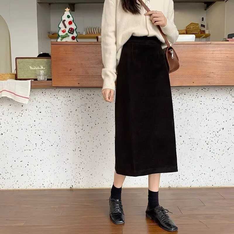 Woolen midi skirt for women high waisted autumn and winter 2026 new item covering the hips to show off thinness medium to lo M260314