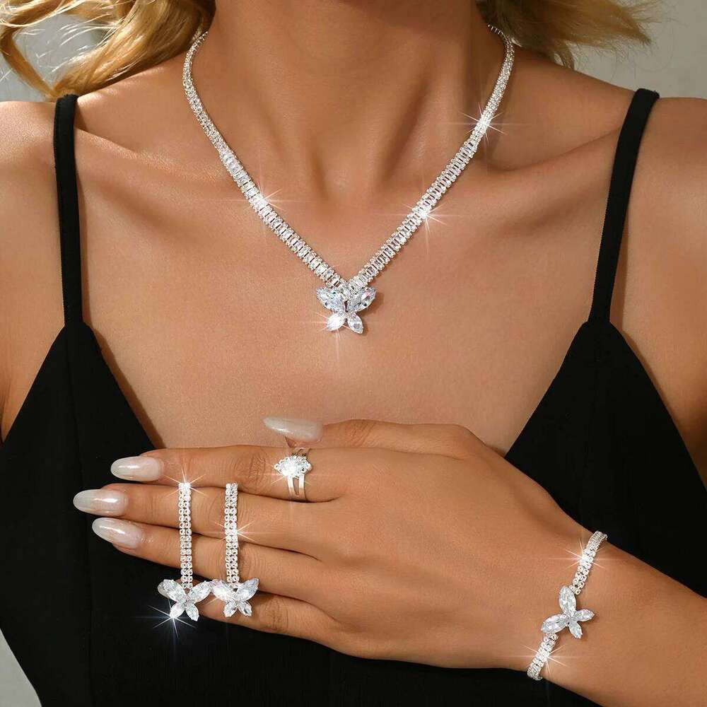 Full diamond design butterfly Korean version chic slimming earrings necklace bracelet ring four piece set as a birthday gift Z260313