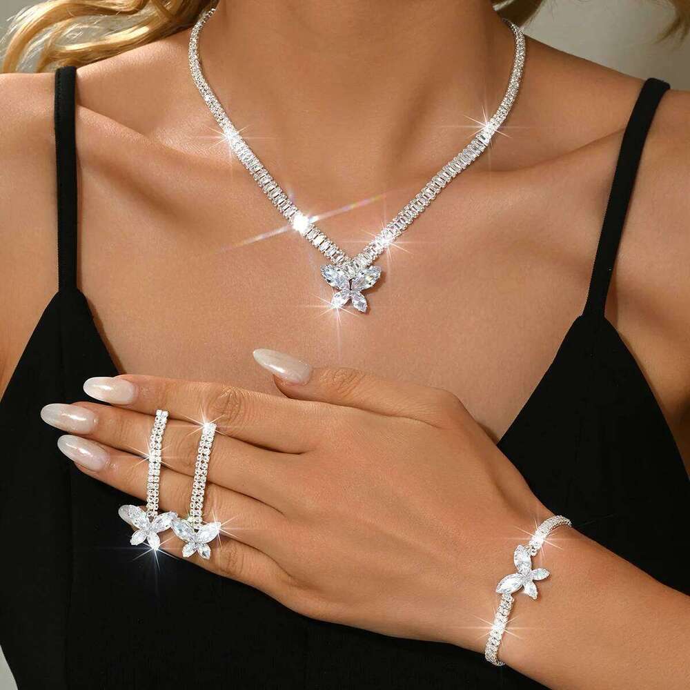 Full diamond design butterfly Korean version chic slimming earrings necklace bracelet ring four piece set as a birthday gift Z260313