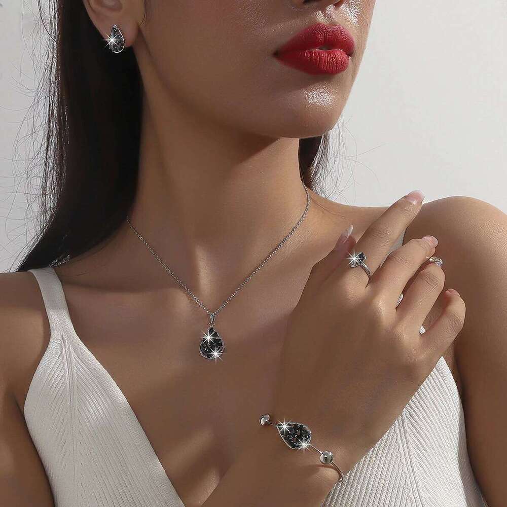 Four sets of water droplet necklace earrings, French style light luxury temperament, high-end design earrings for women Z260313