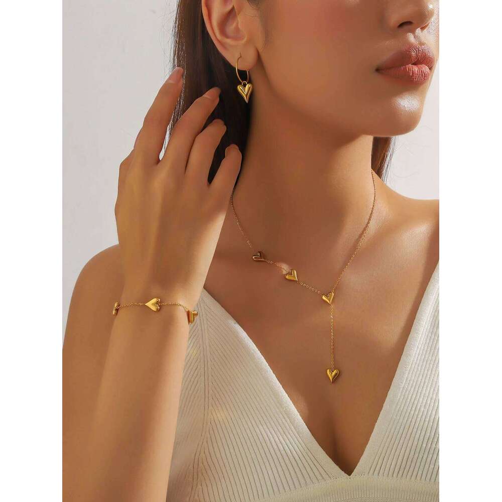 Europe and the United States Sweet Heart Tassel Necklace female minority design love bracelet earrings jewelry set Z260313
