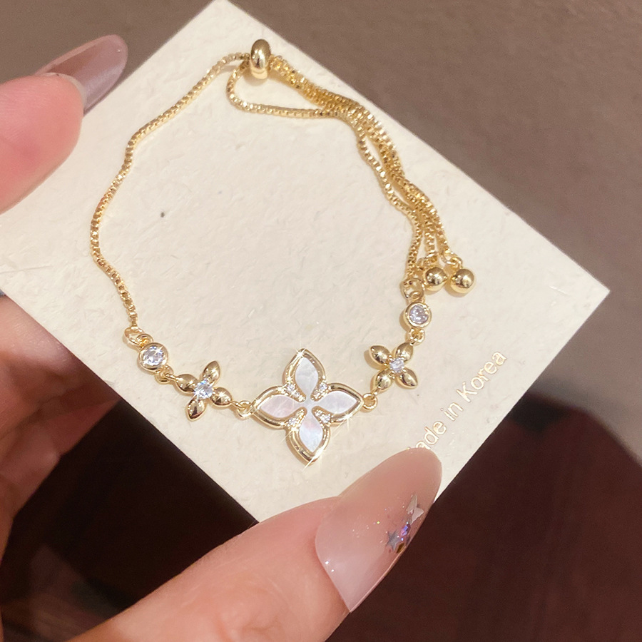 2026 New Exquisite Shiny White and Pink Shell Hollow Lucky Four-Leaf Clover Pull-Chain Bracelet for Women, Niche Light Luxury Jewelry - view 6