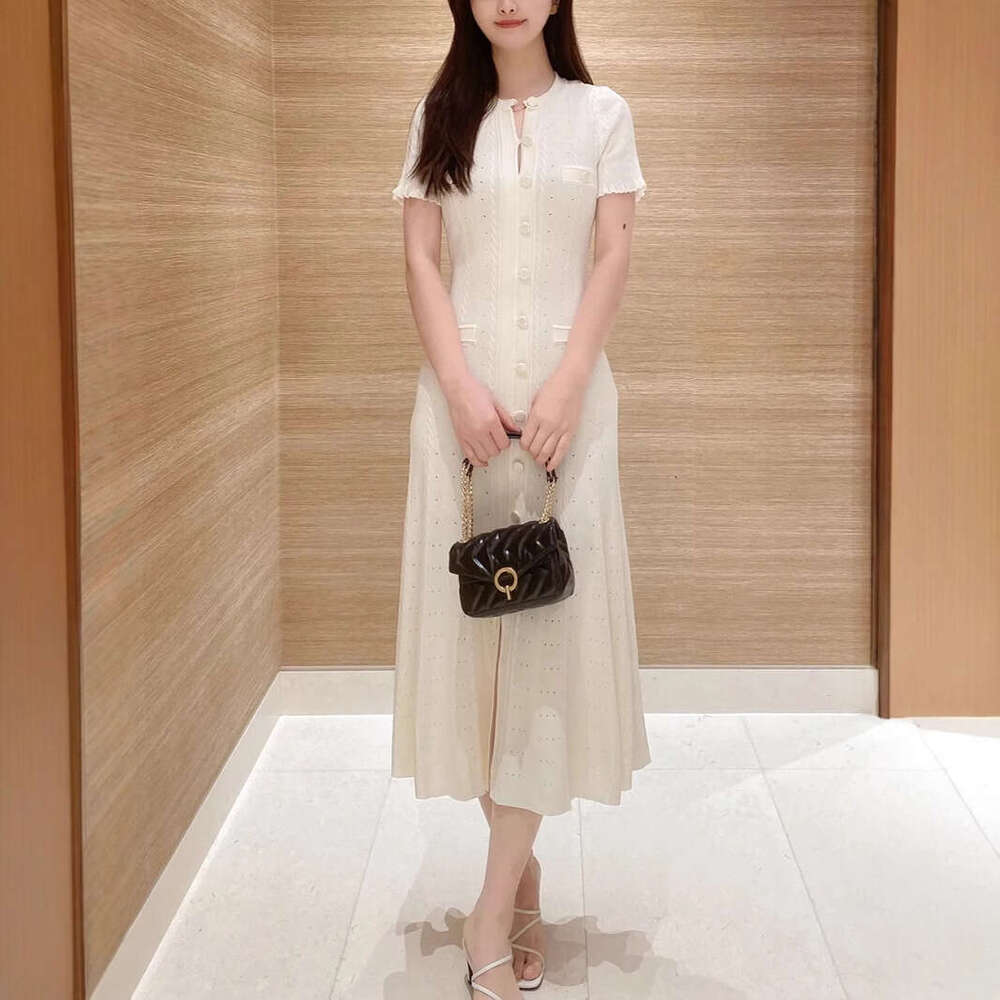 2026 Gentle and Fragrant Style Spring and Autumn Light Luxury Knitted Coat with Lotus Leaf Edge First Love Hollow Long Skirt