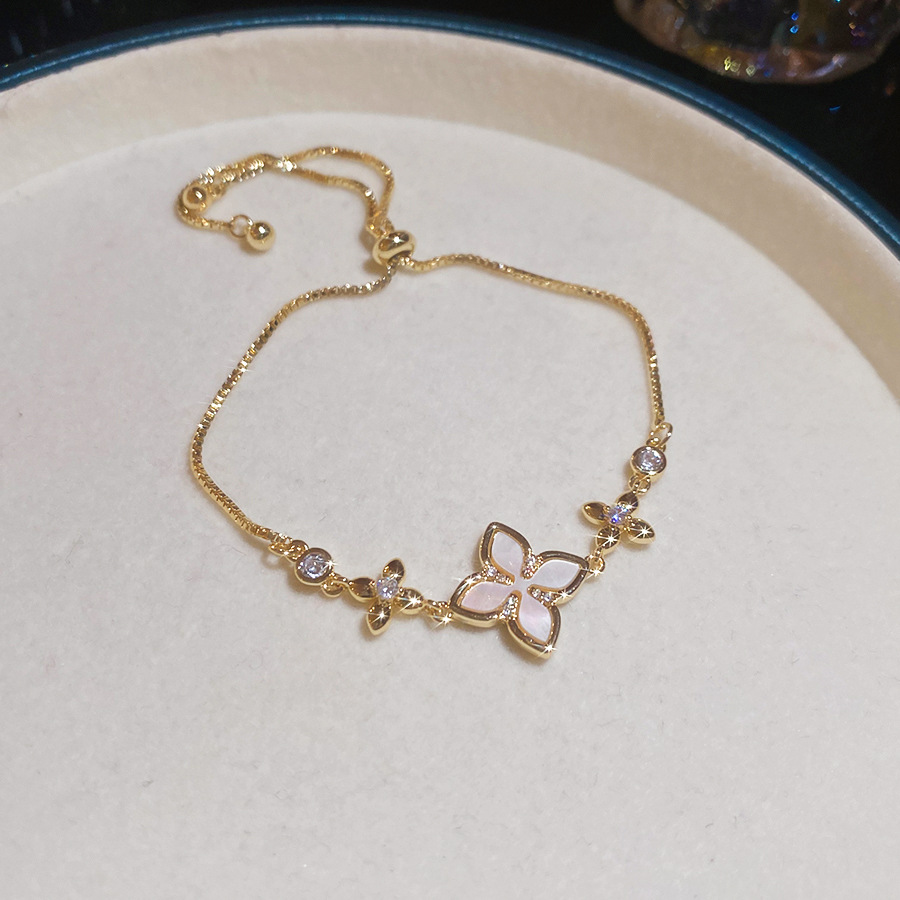 2026 New Exquisite Shiny White and Pink Shell Hollow Lucky Four-Leaf Clover Pull-Chain Bracelet for Women, Niche Light Luxury Jewelry - view 5