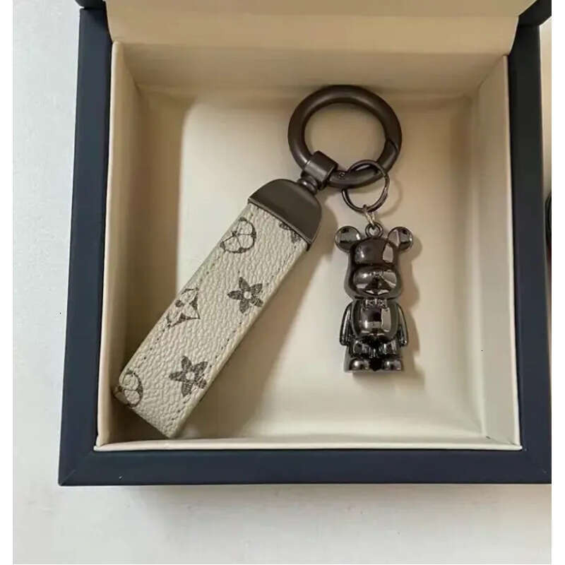 Designer Creative Multifunctional Keychain Monogram Leather Wrist Strap Metal Bear Bag Charm Car Key Ring Pendant for Daily Wear & Gifting
