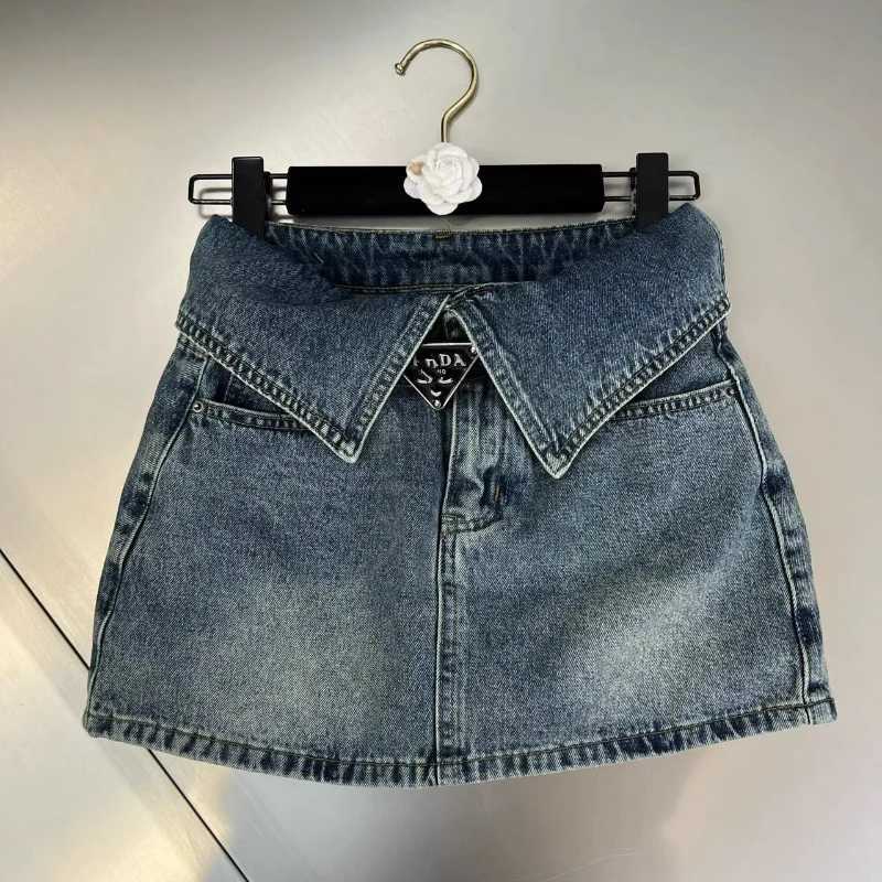 2024 summer Korean style niche design slimming high waist cuffed denim short skirt for women anti-exposure A-line hip skirt M260316