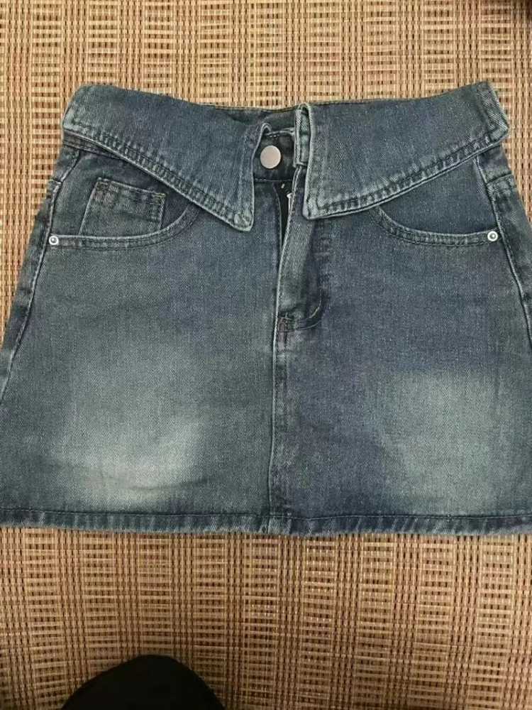 2024 summer Korean style niche design slimming high waist cuffed denim short skirt for women anti-exposure A-line hip skirt M260316