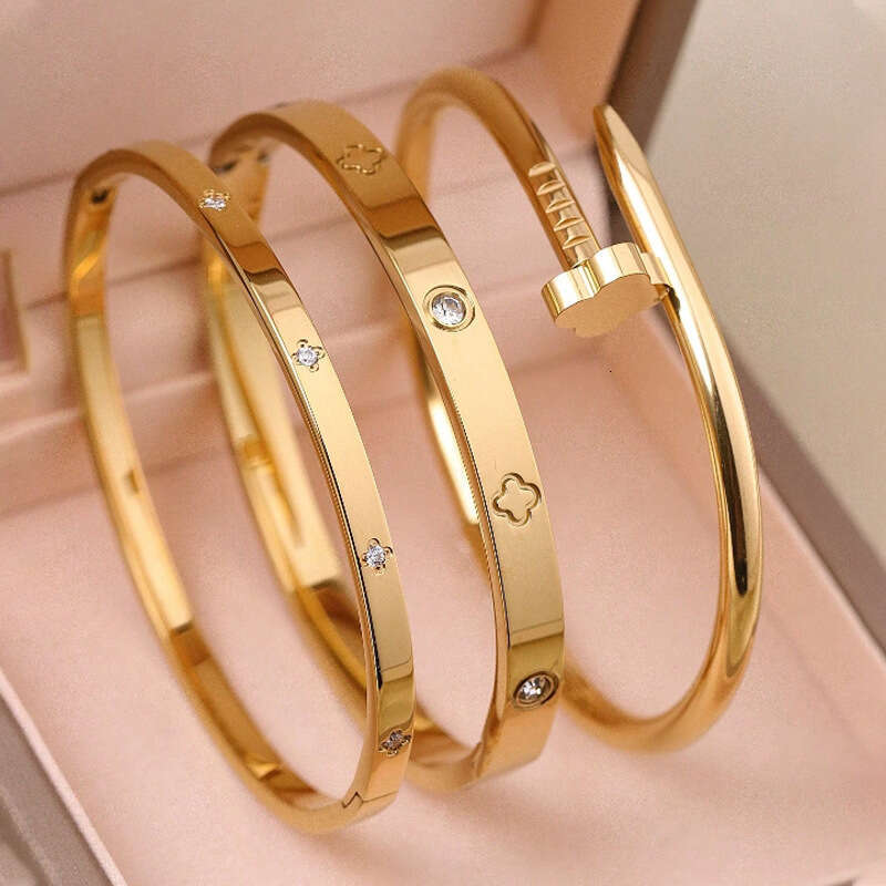 European and American cross border fashion gold-plated four-leaf clover diamond embellished open bracelet for women light luxury versatile stackable s