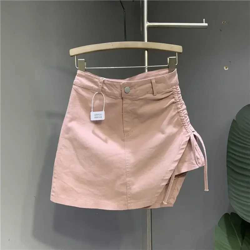 Pink denim skirt female 2024 summer new design sense irregular drawstring casual fashion temperament slim A-line skirt M260316