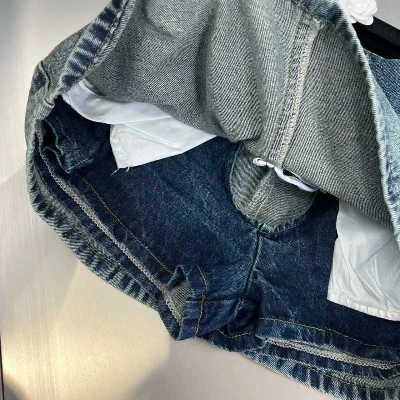 2024 summer Korean style niche design slimming high waist cuffed denim short skirt for women anti-exposure A-line hip skirt M260316