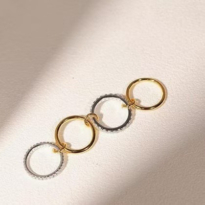 Stackable 18K Titanium-Steel Ring with Cubic Zirconia and a Thick, High-Gloss Gold and Silver Double Band