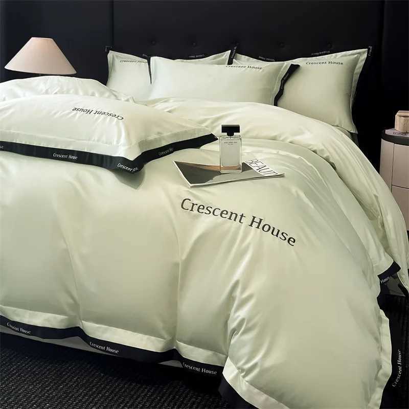 2025 spring and summer new light luxury fashion embroidery washed ice silk four-piece set simple solid color high-end bed sheet D260317