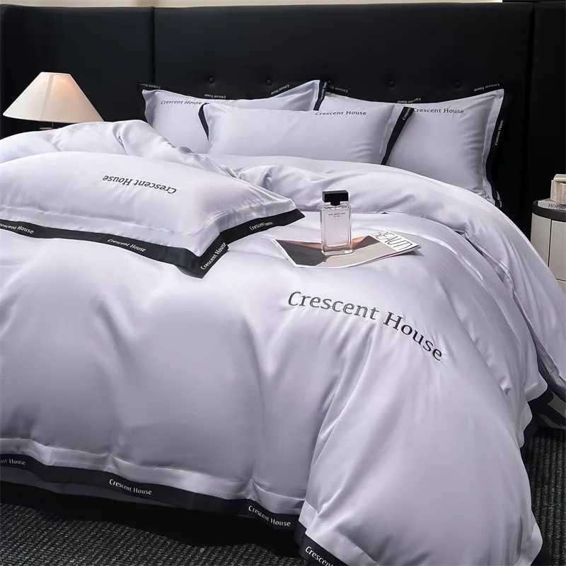 2025 spring and summer new light luxury fashion embroidery washed ice silk four-piece set simple solid color high-end bed sheet D260317