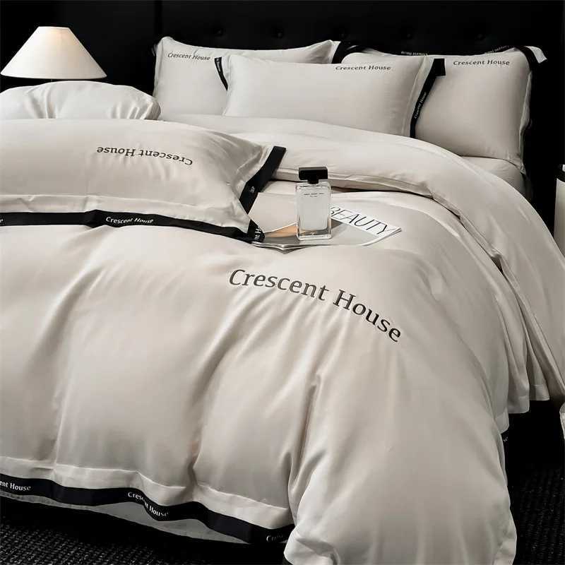 2025 spring and summer new light luxury fashion embroidery washed ice silk four-piece set simple solid color high-end bed sheet D260317