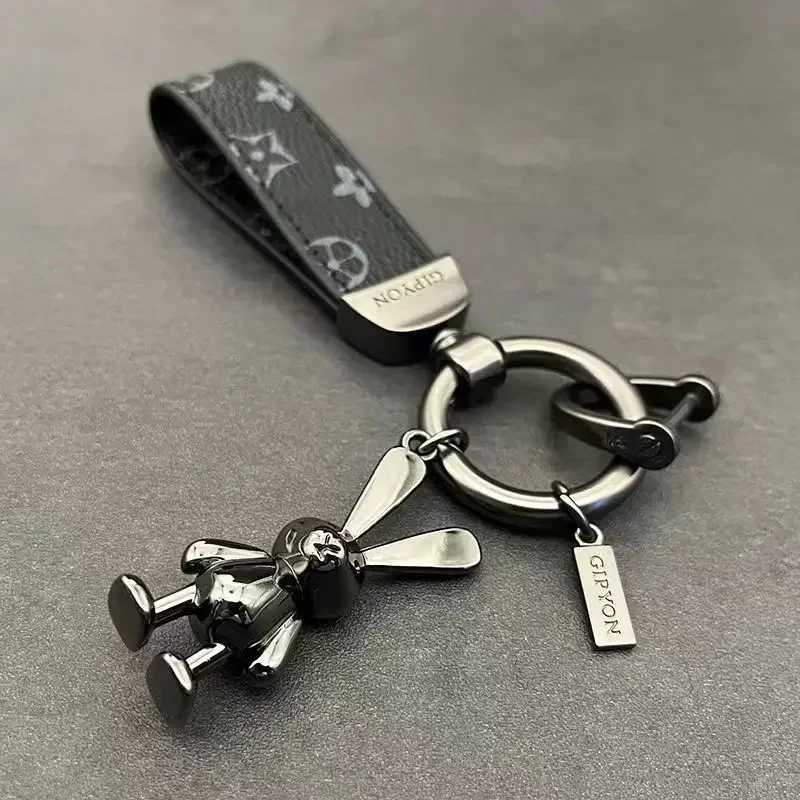 Neutral leather rotating car Continente chain cute Pareja pendant Alta Calidad gift 2025 H2603181 - view 5