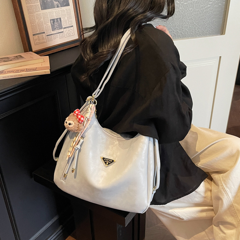 New hot selling multifunctional leisure backpack for women large capacity handheld commuting shoulder bag Korean version texture tote bag