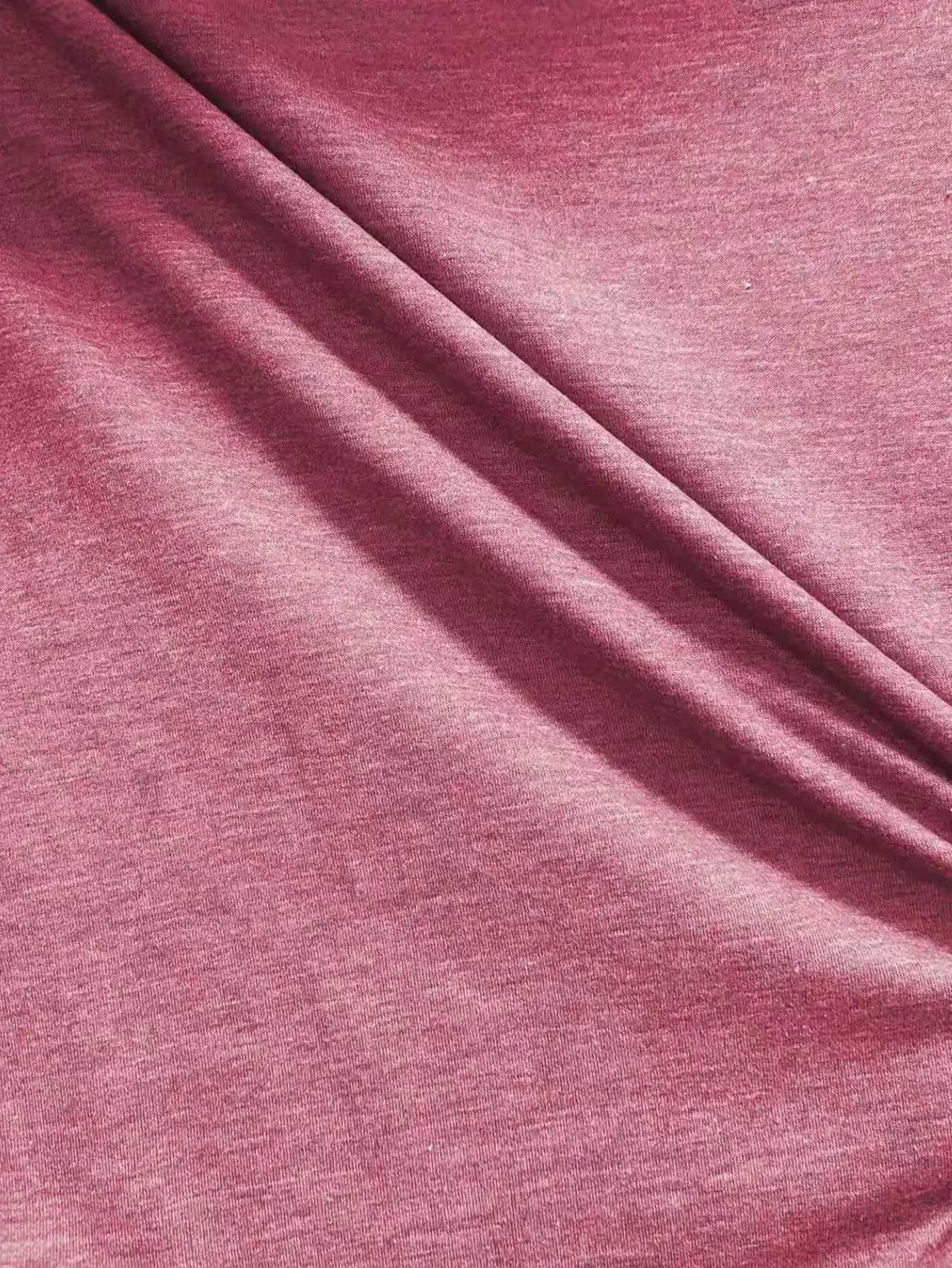 Womens long sleeved loose round neck top elegant solid color polyester knitted T-shirt autumn and winter fashion heart patternT260317