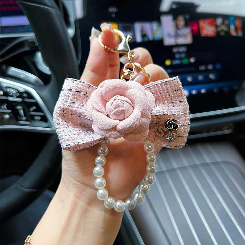 Creative pearl string camellia keychain bow fabric bag keychain pendant fashion car charm H260318 - view 6