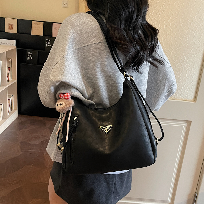 New hot selling multifunctional leisure backpack for women large capacity handheld commuting shoulder bag Korean version texture tote bag
