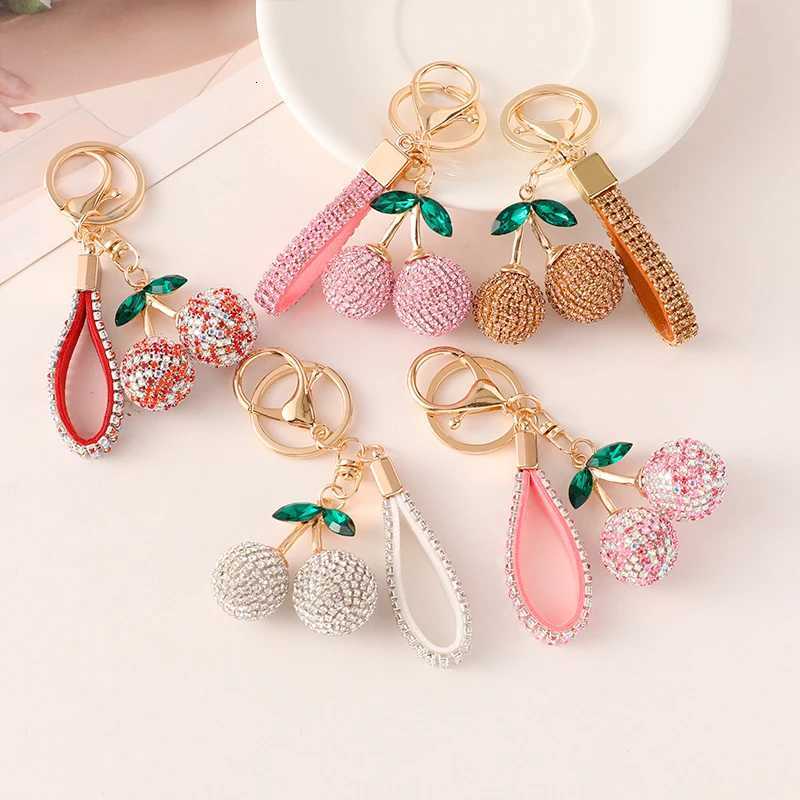 2025 New Cherry KeyChain Claw Chain Craft Full Crystal Rhinestone Womens Luxury Bags Pendant Souvenir Gifts for Family Friend H260318 - view 3