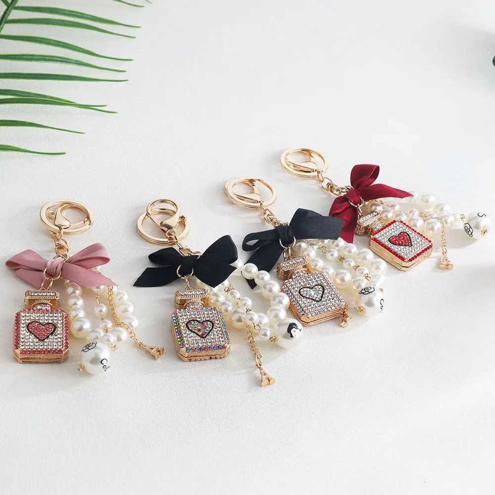 Perfume Bottle Bowknot Alloy Key Chain Pendant Bag Pearl Pendant Creative Gift Valentines Day Gift Jewelry H260318 - view 3