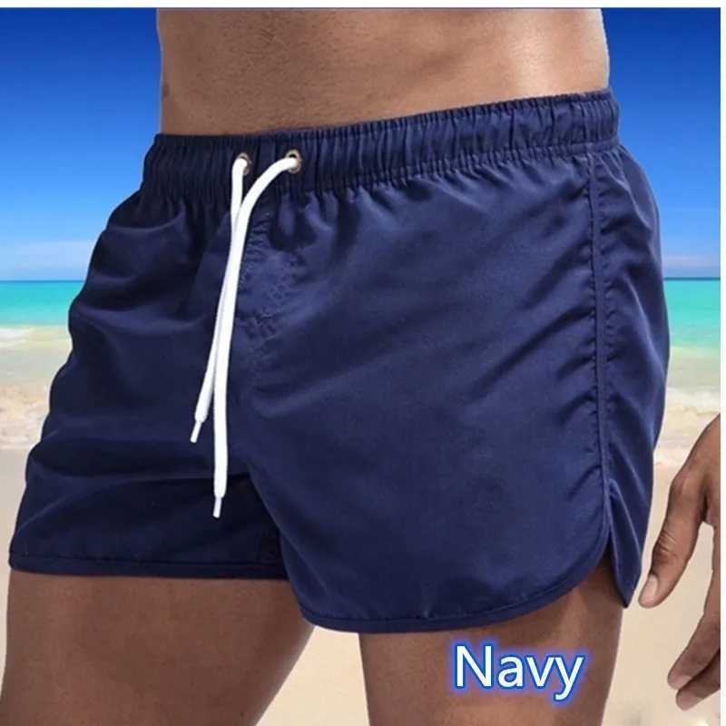 Fitness mens fashionable sports shorts running speed dry pants spring and summer thin training beach pants M260318