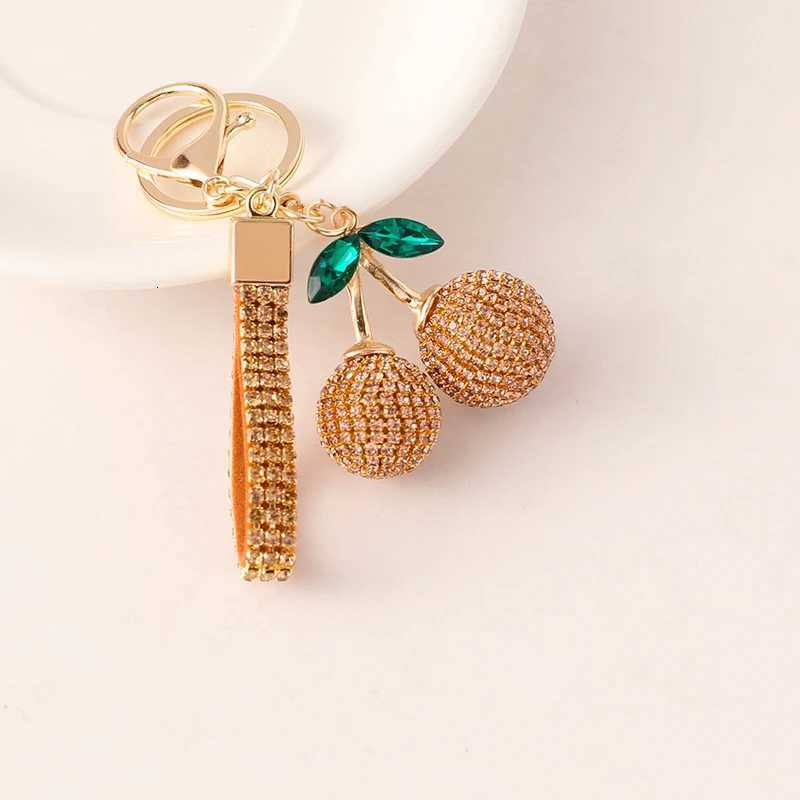 2025 New Cherry KeyChain Claw Chain Craft Full Crystal Rhinestone Womens Luxury Bags Pendant Souvenir Gifts for Family Friend H260318 - view 7