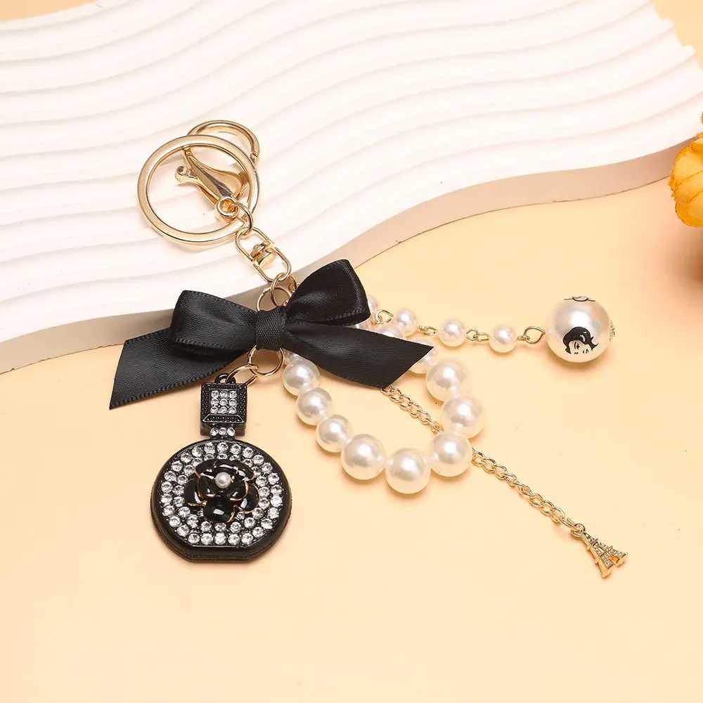 Number 5 Camellia Flower Bag Pendant For Woman Luxury Jewelry Bow Car Keyring Bowknot Camellia Pearl Keychains Bag Decoration H260318 - view 4