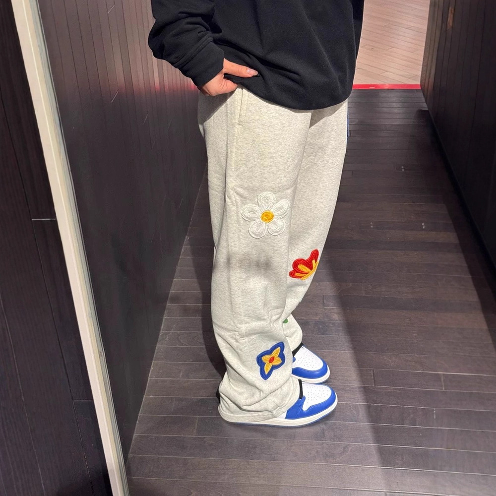 Luxury Brand Designer American-style floral embroidery curved hem sweatpants for men niche design loose casual sports cleanfit micro-flared straight p