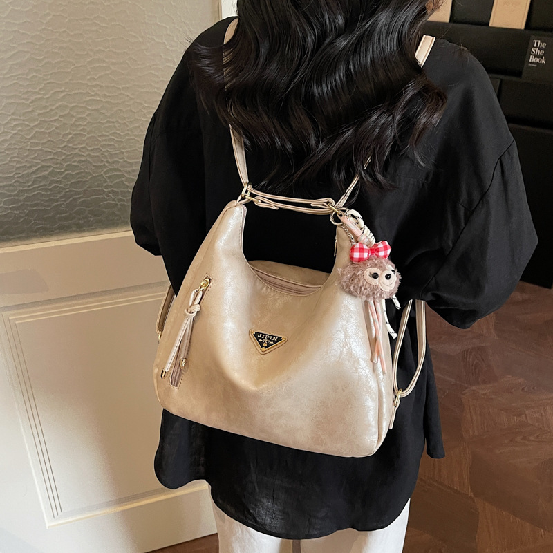 New hot selling multifunctional leisure backpack for women large capacity handheld commuting shoulder bag Korean version texture tote bag