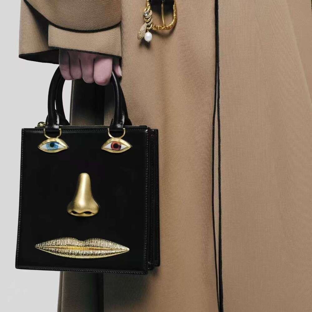 2026 New Schiaparelli Style Face Bag Women Top Handle Evening Bag Smooth Cowhide Leather Luxury Fashion Personality Party Clutch Handbag SENYY