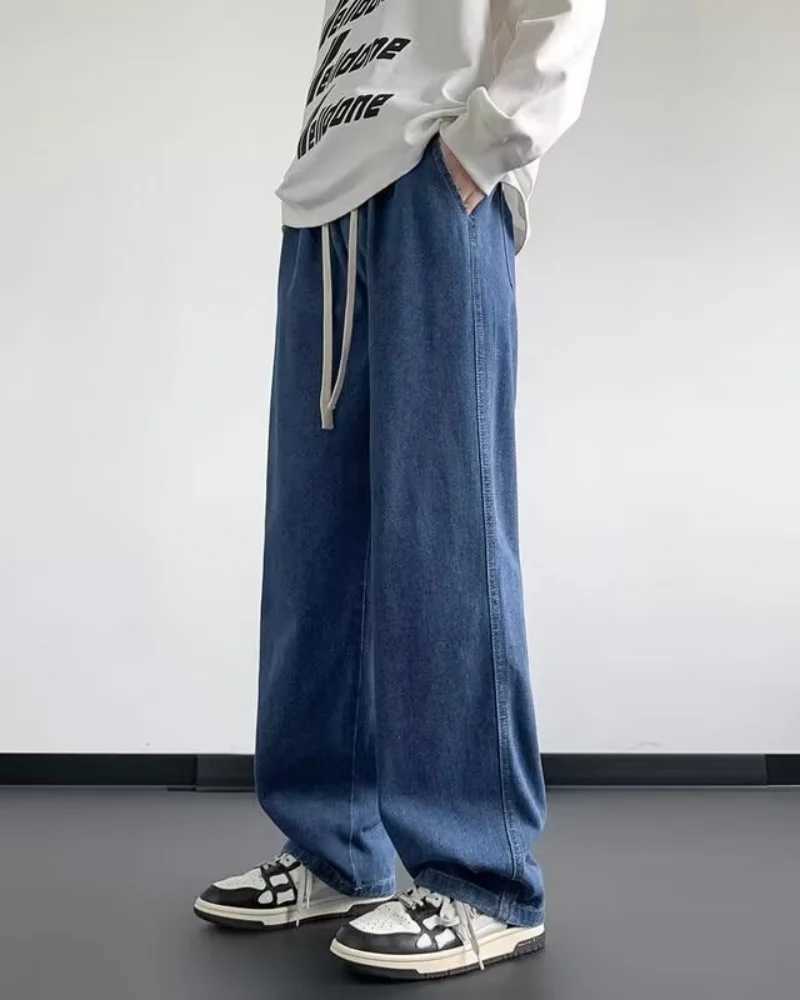 2026 new streetwear loose jeans mens Korean fashion loose straight leg wide leg pants mens brand clothing black light blue M260319
