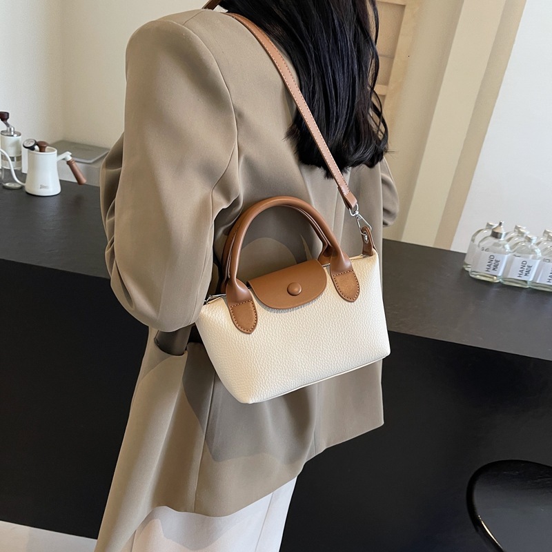 2026 Luxury Premium Color Contrasting Women's Handbag Fashion Simple PU Soft Leather Mini Single Shoulder Crossbody Bag New Fashion Western Style
