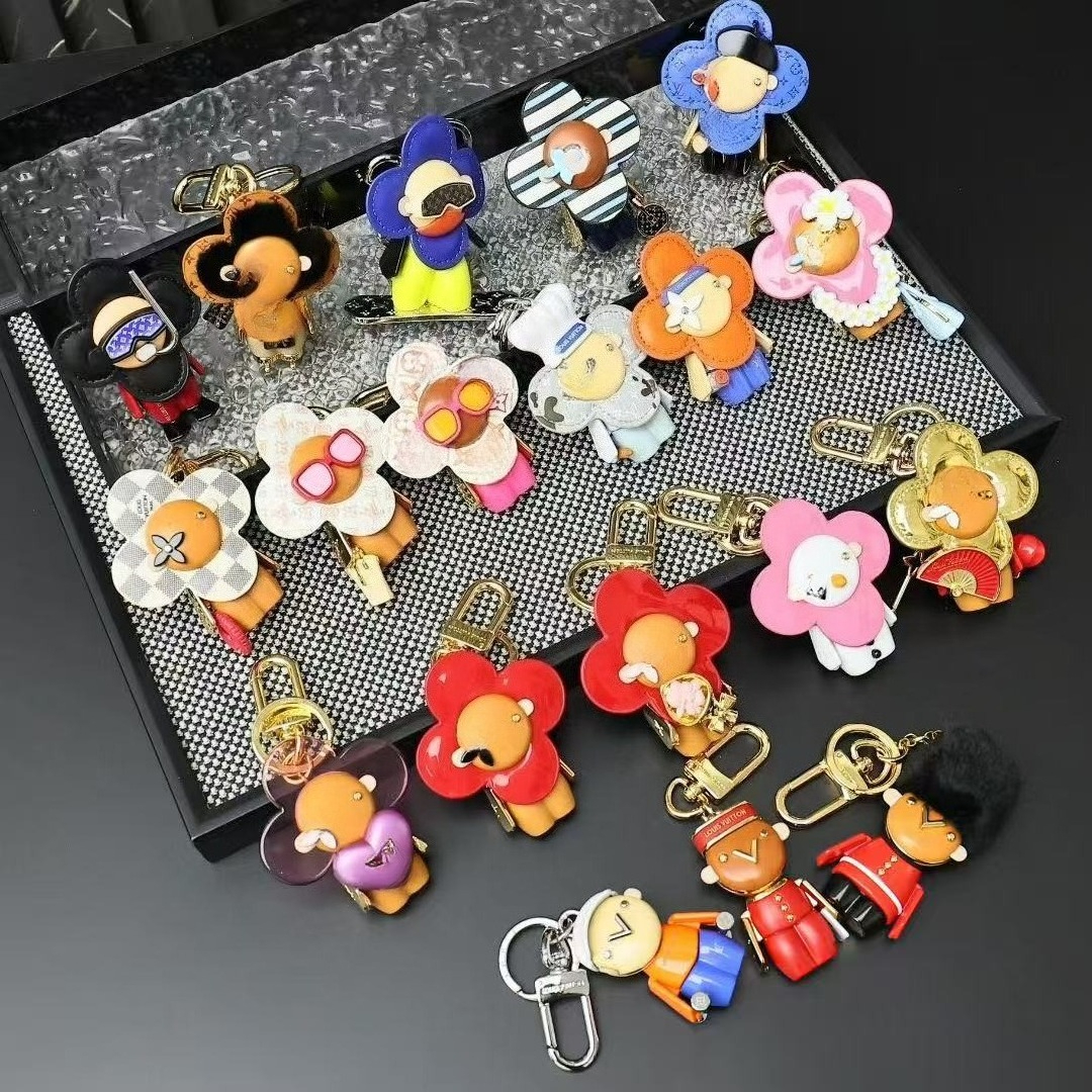 Designer Sunflower Doll Bag Charms Luxury Keychain Classic Leather Accessory Keyrings For Women Mans Lanyard Key Chain Purse Charm Cute Gifts