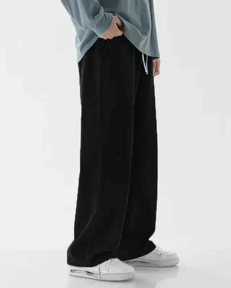 2026 new streetwear loose jeans mens Korean fashion loose straight leg wide leg pants mens brand clothing black light blue M260319