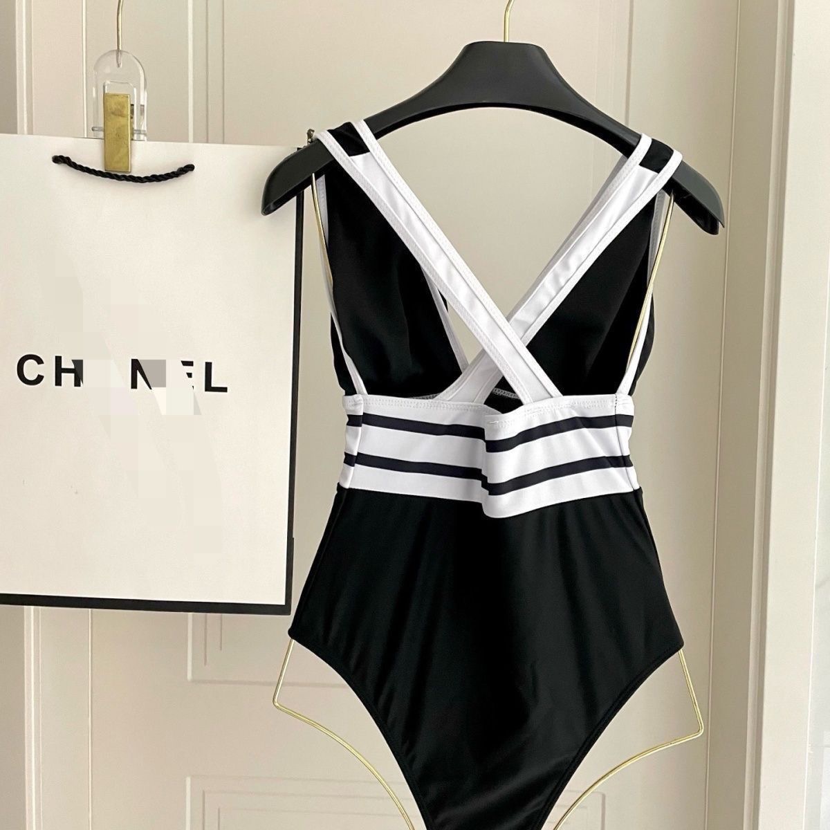 European and American new backless women's solid color one-piece slimming swimsuit hot spring triangle swimsuit sexy bikini swimsuit