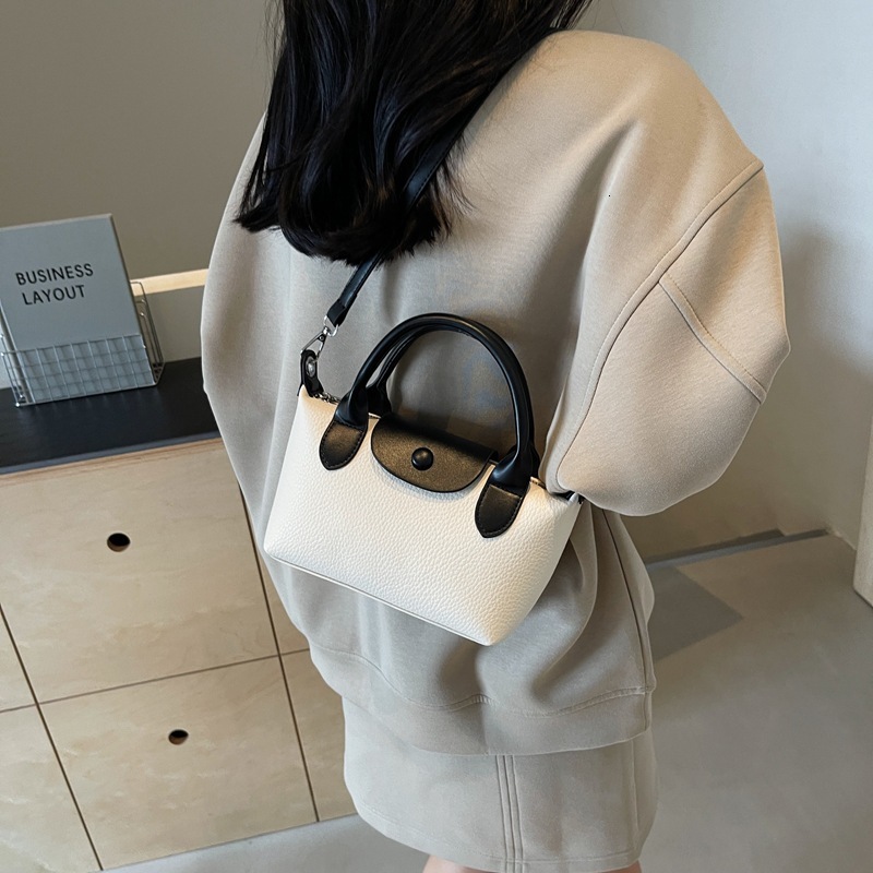 2026 Luxury Premium Color Contrasting Women's Handbag Fashion Simple PU Soft Leather Mini Single Shoulder Crossbody Bag New Fashion Western Style