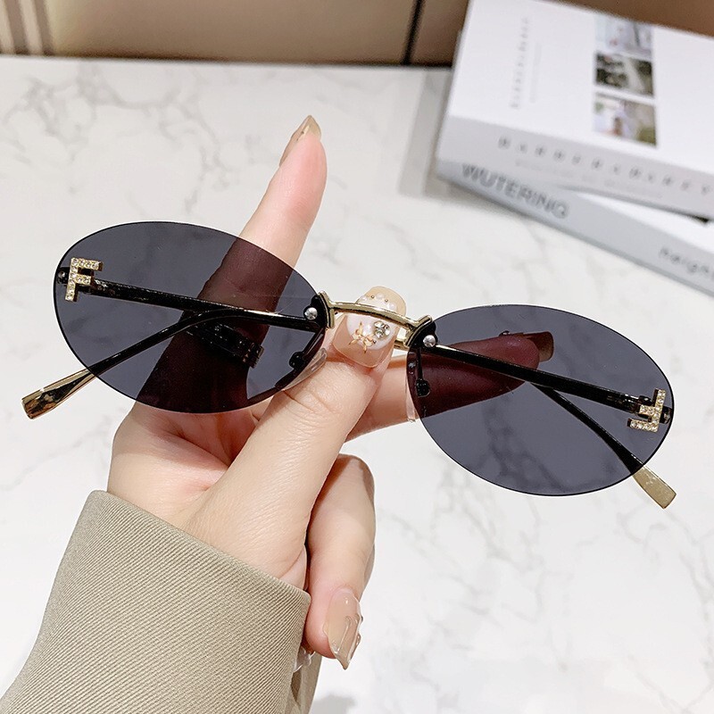 Luxury Brand Designer Jewelry Letter F Frameless Rhinestone Sunglasses Oval Frame Fashion Sunglasses European And American Trend Small Frame Decorativ