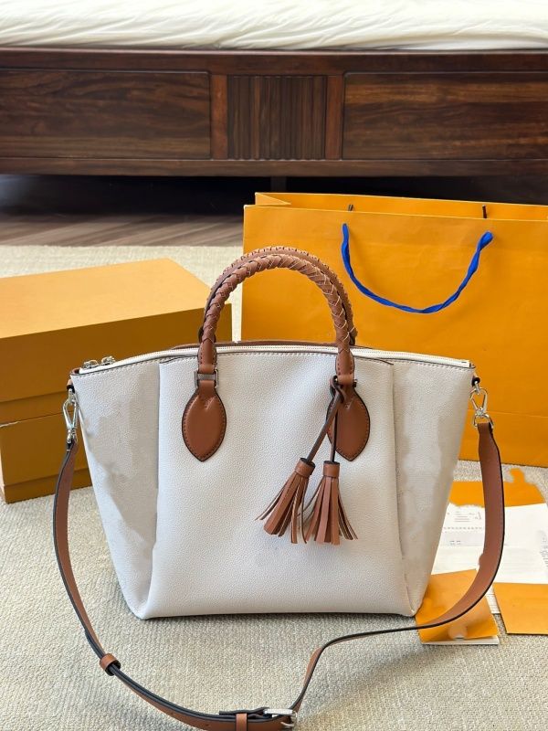 Designer bag Woven handle tassel Haumea tote bag women Fashion shopping shoulder bag handbags basket bag crossbody messenger bag baguette bag pillow bag saddle bag