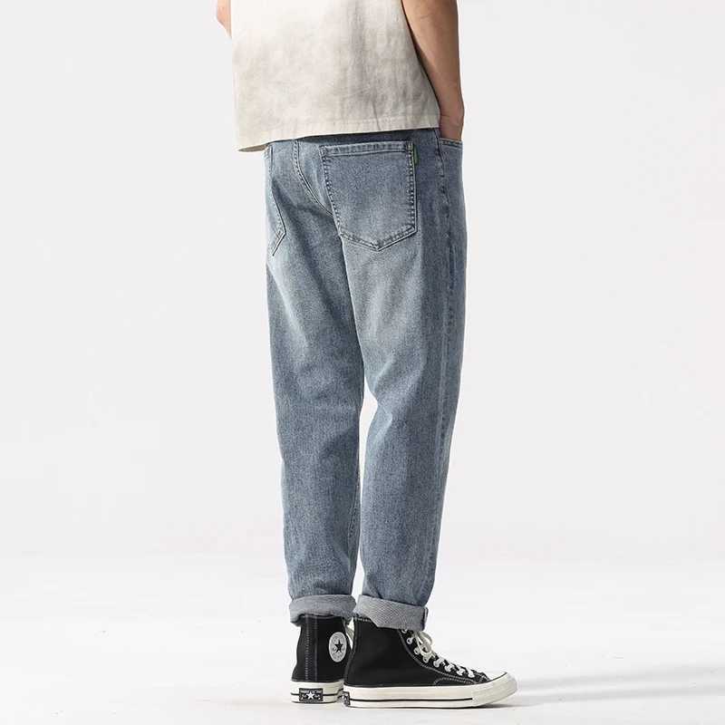 New mens light blue washed denim jeans are casual loose and personalized worn denim pants are easy to match for daily use D260320