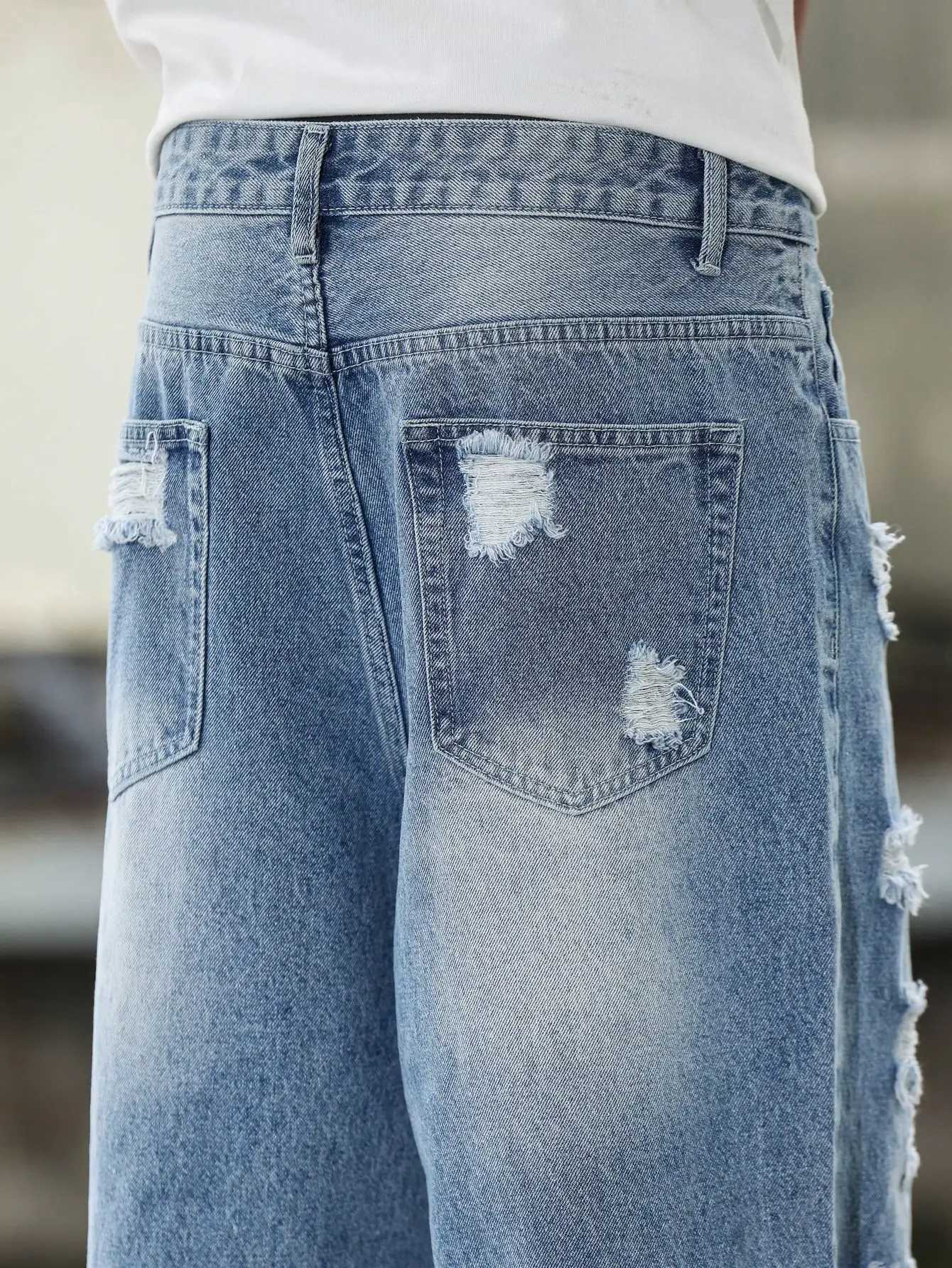 Mens Blue Ripped Denim Harem Pants for Spring and Autumn Street Fashion Casual Trend D260320