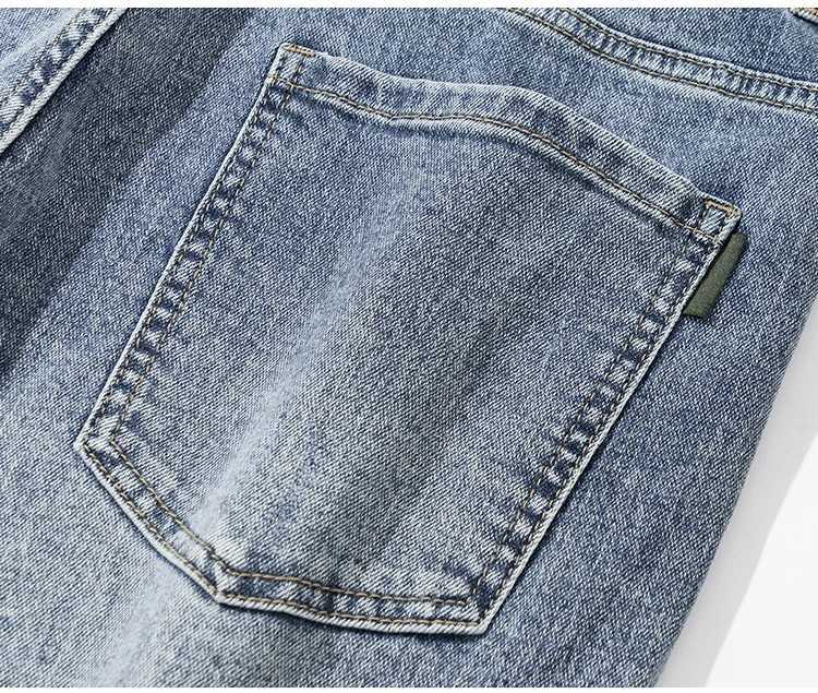 New mens light blue washed denim jeans are casual loose and personalized worn denim pants are easy to match for daily use D260320