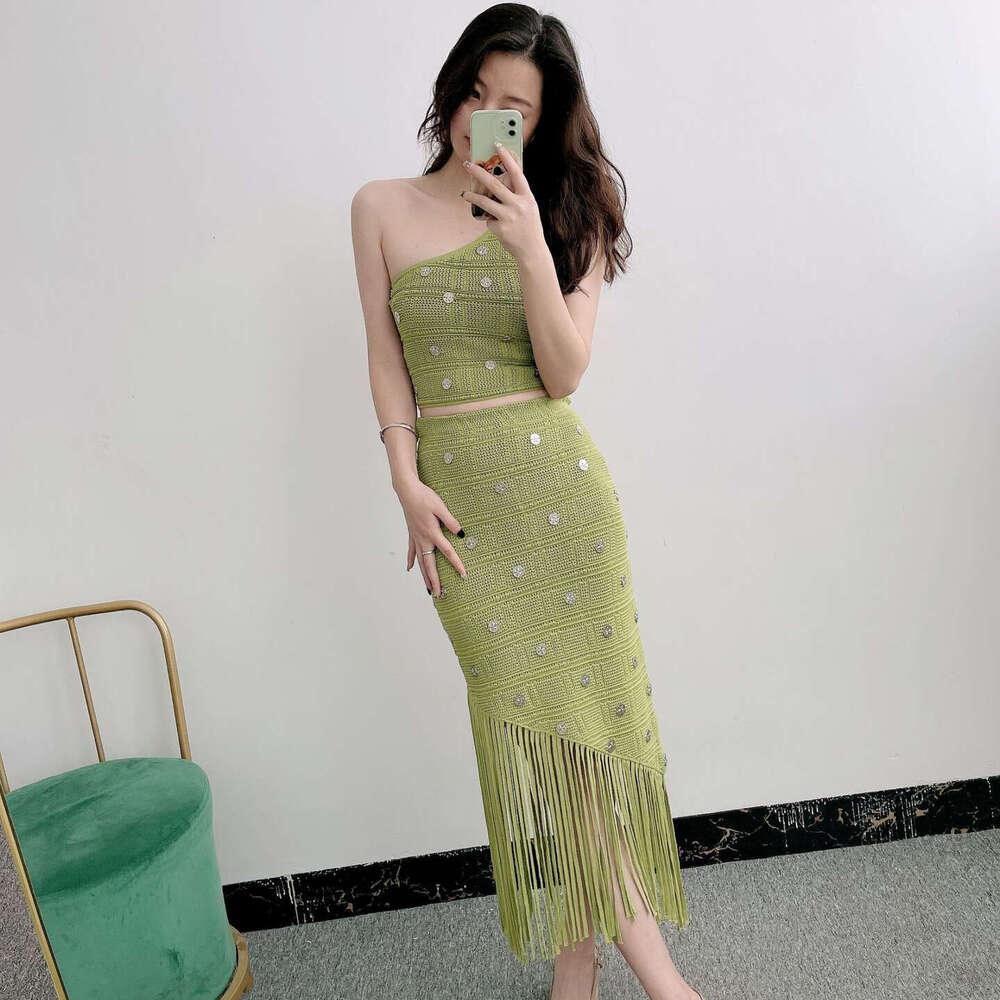New designer French S6 niche vacation style single shoulder strap tassel knit skirt for summer 2026