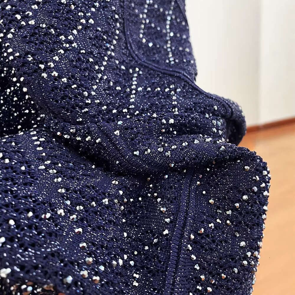 2026 Spring New Ultra Fine Sparkling Hollow Rhinestone Decorative Lined X21 Cardigan Women's Skirt Set