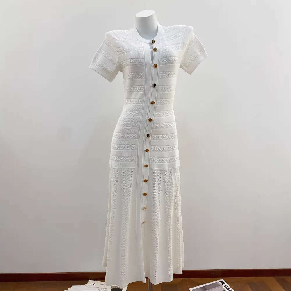 2026 Spring New French Heavy duty Craft Hollow Crochet Single breasted Elegant Slimming Wrinkle Long Knitted Dress