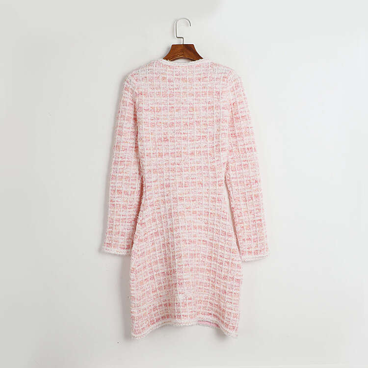 2026 autumn and winter designer pink checkered sweet knitted k30 round neck long sleeved dress, small fragrant style mid length skirt
