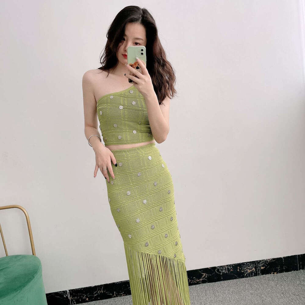 New designer French S6 niche vacation style single shoulder strap tassel knit skirt for summer 2026