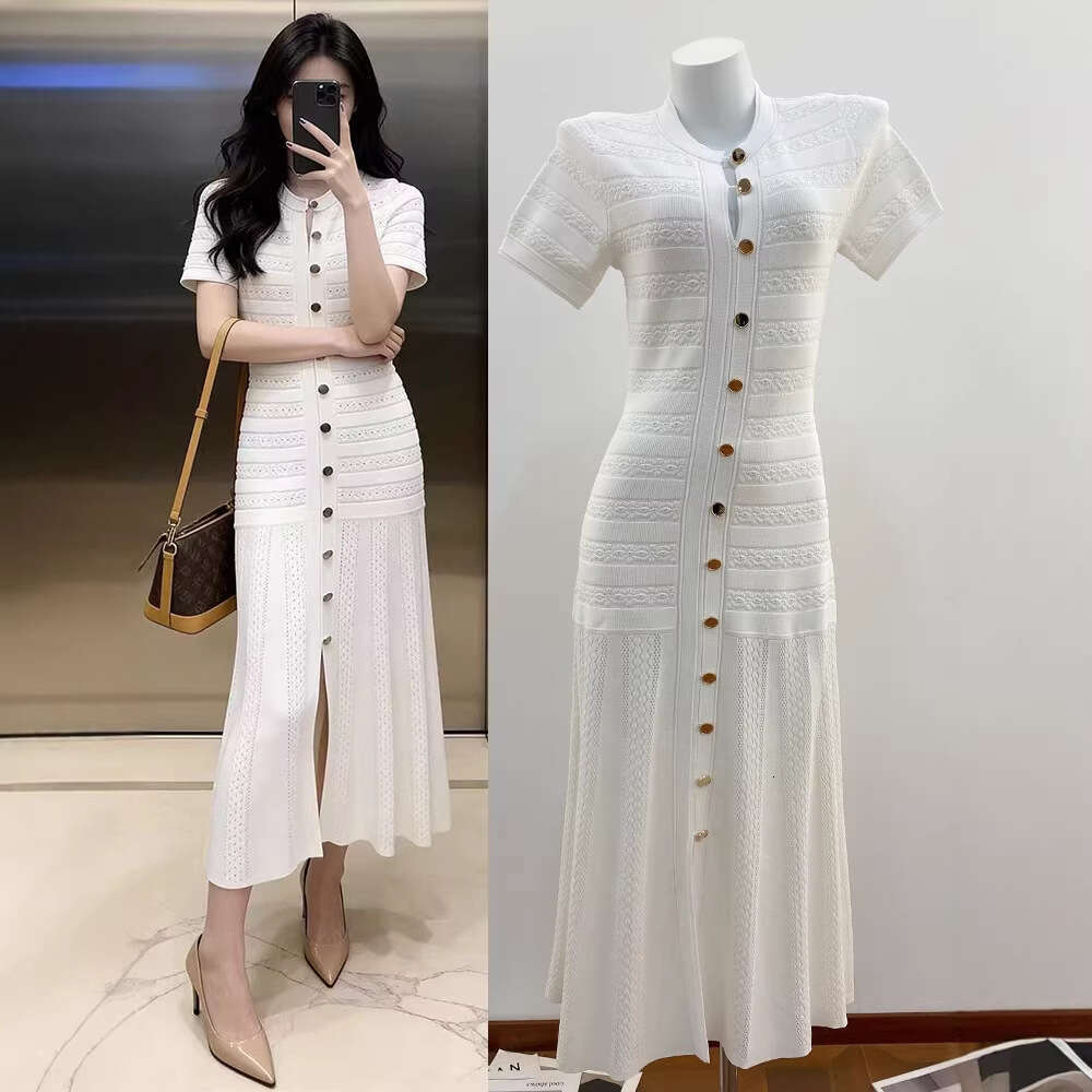 2026 Spring New French Heavy duty Craft Hollow Crochet Single breasted Elegant Slimming Wrinkle Long Knitted Dress